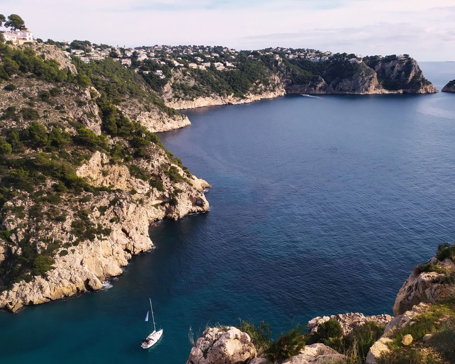 Divorce by Mutual Consent in Spain for American Citizens 1 The calm bay and cliffs of the Jávea coast, Costa Blanca